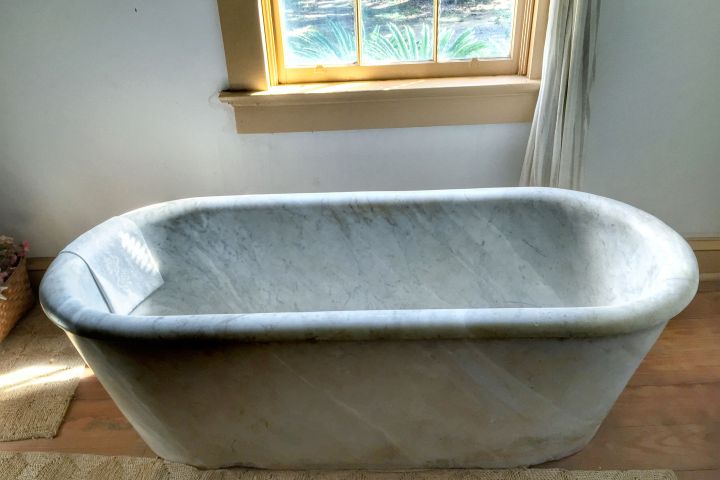 a bowl of cereal next to a window