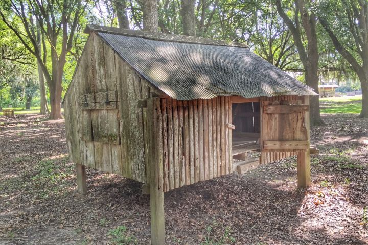 a house with a wooden fence