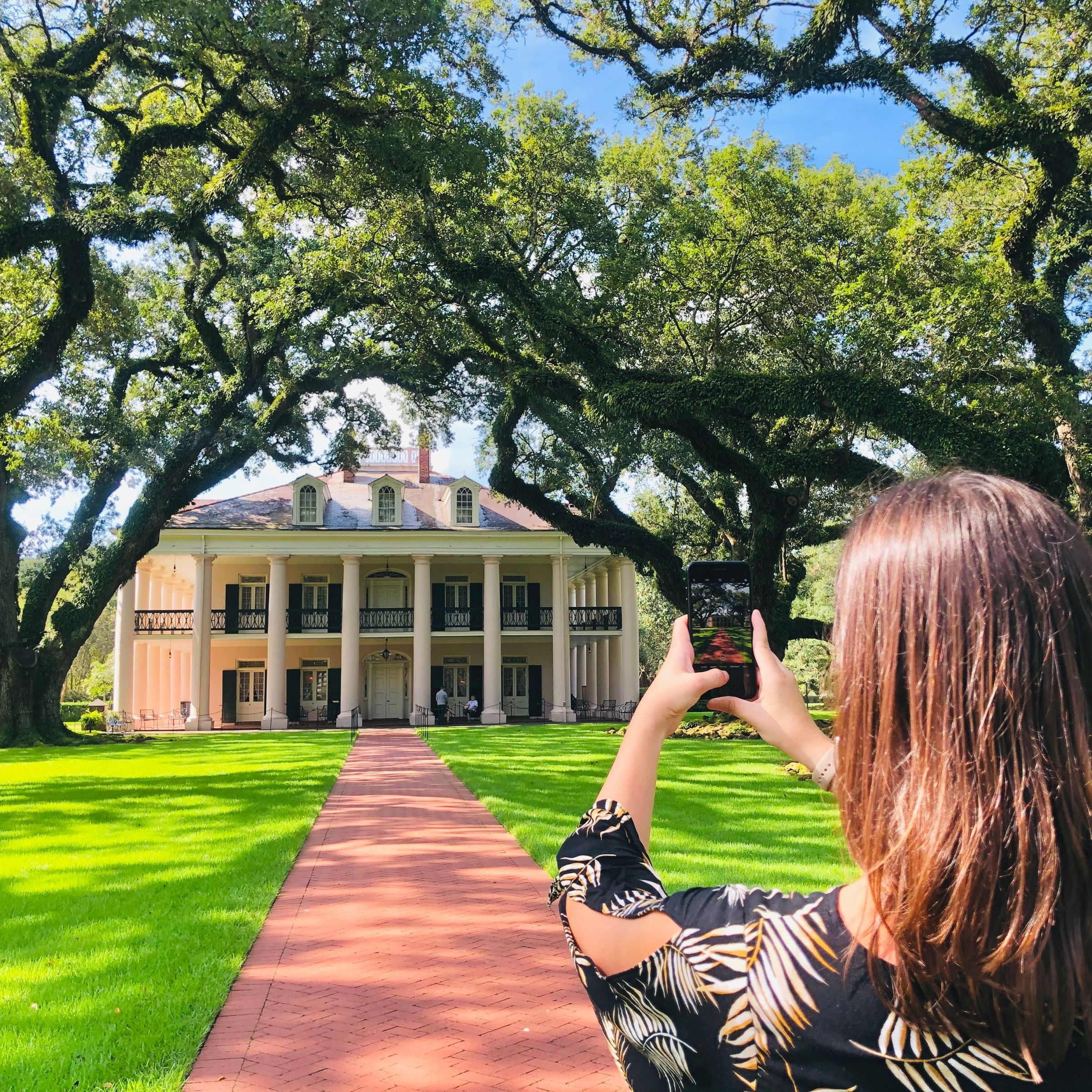 a person standing in front of a tree